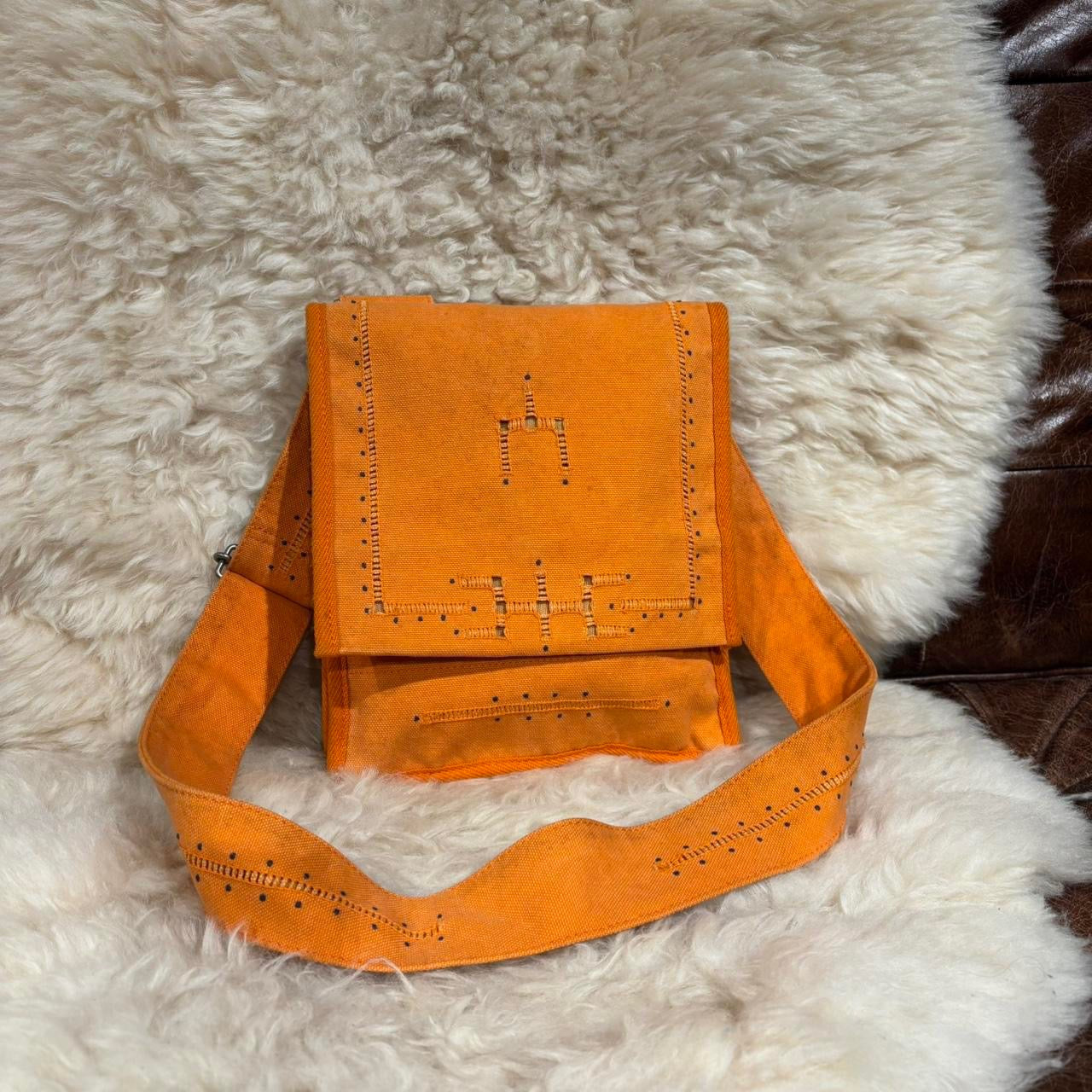 Issey Miyake orange canvas crossbody satchel with adjustable strap