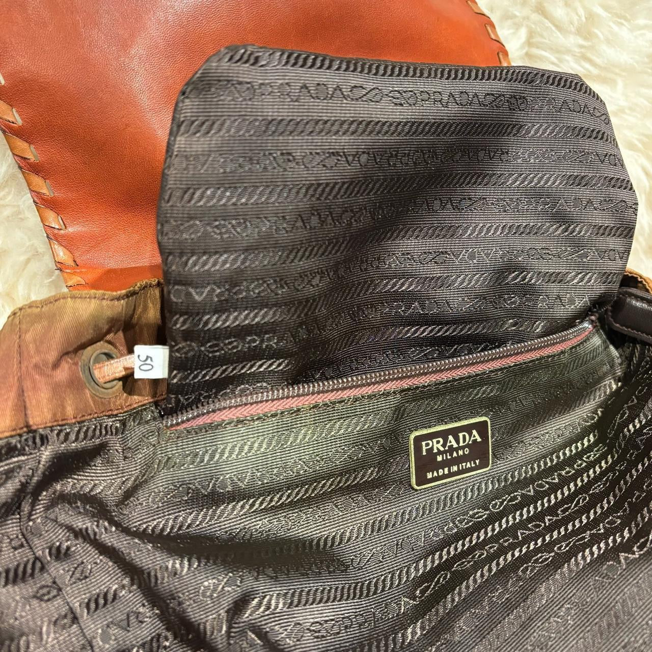 Prada burnt orange nylon and leather backpack