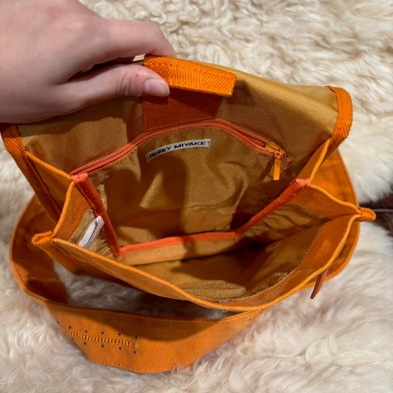 Issey Miyake orange canvas crossbody satchel with adjustable strap