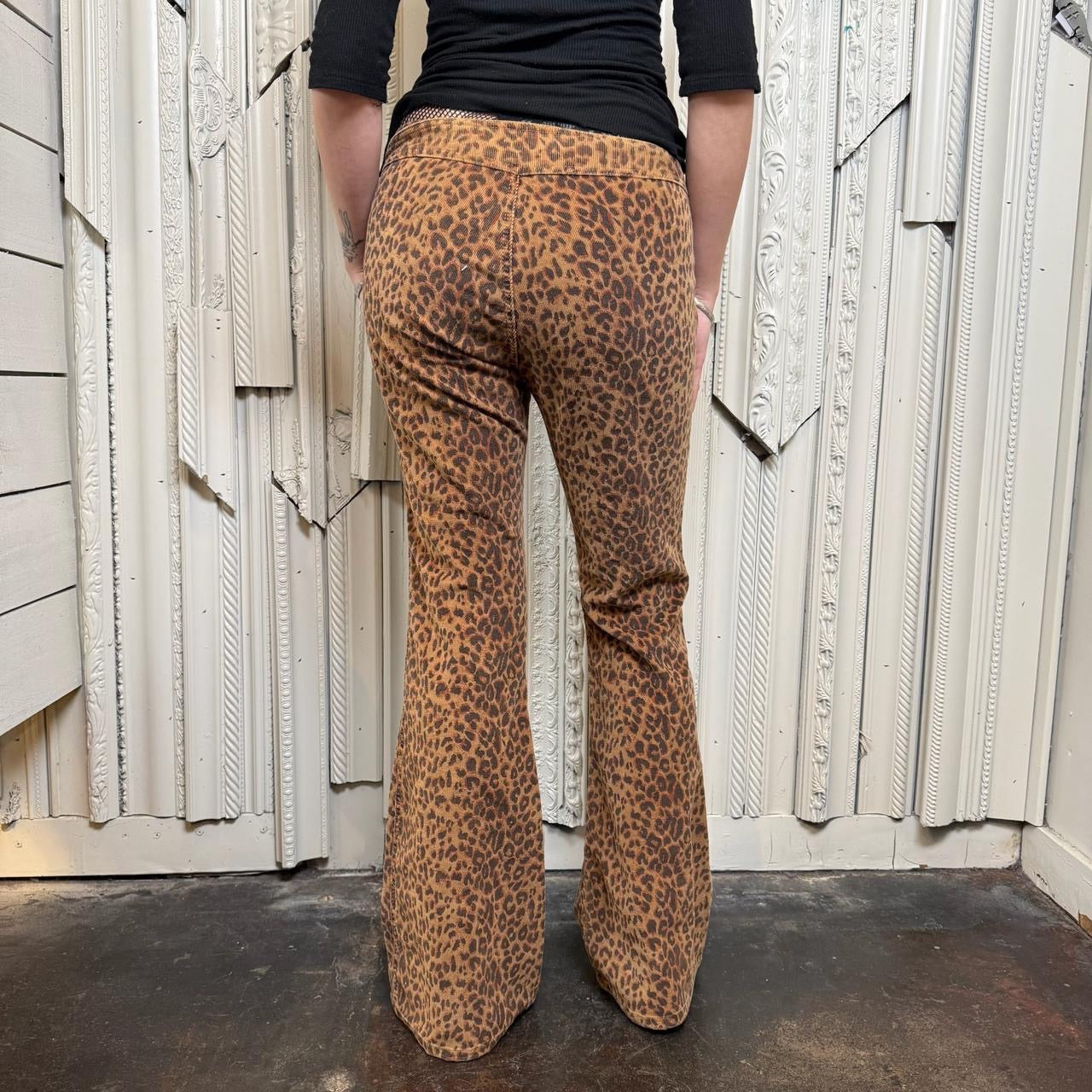 L.E.I. leopard print low rise flare corduroy pants with leather lace up detail