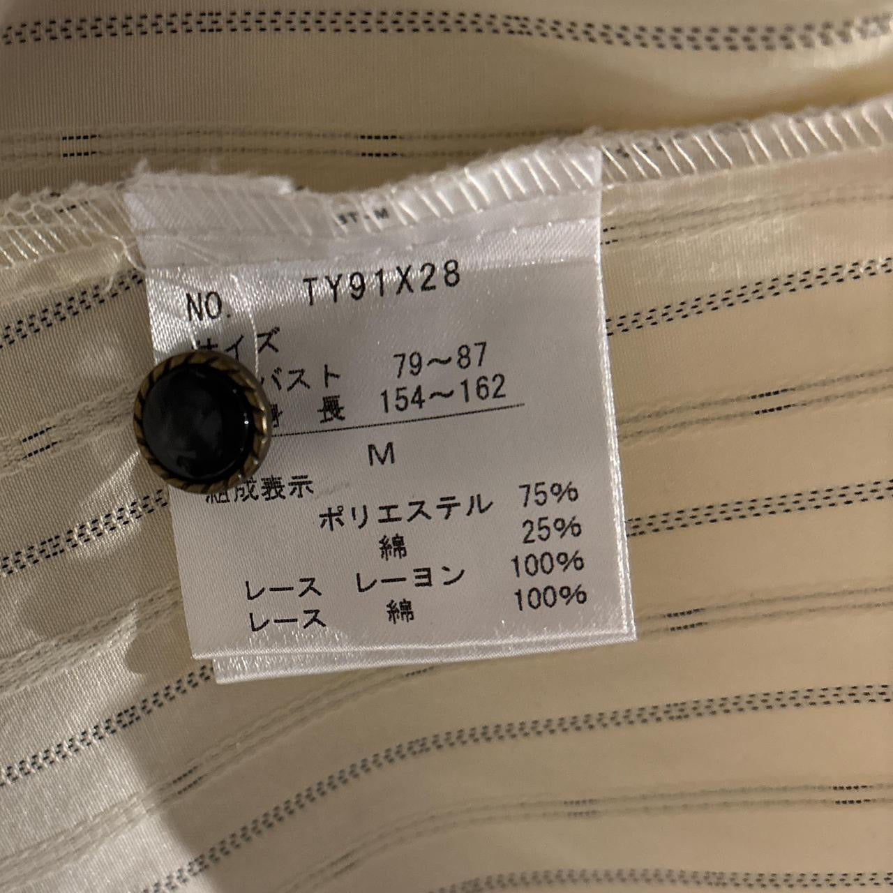 Axes Femme cream and black pinstriped button down
