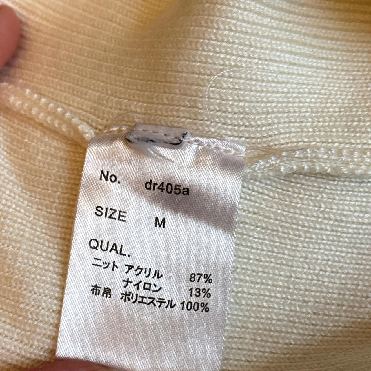 White blouse with ribbed knit waist and ruched puff sleeves