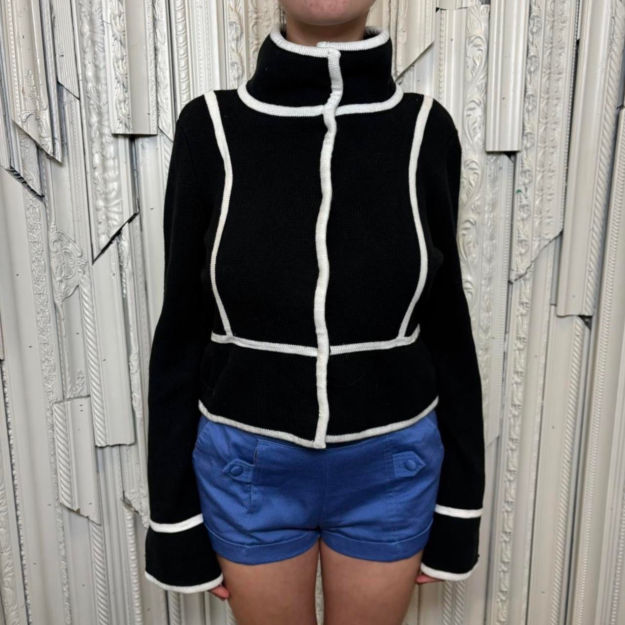 Black and white hidden button sweater