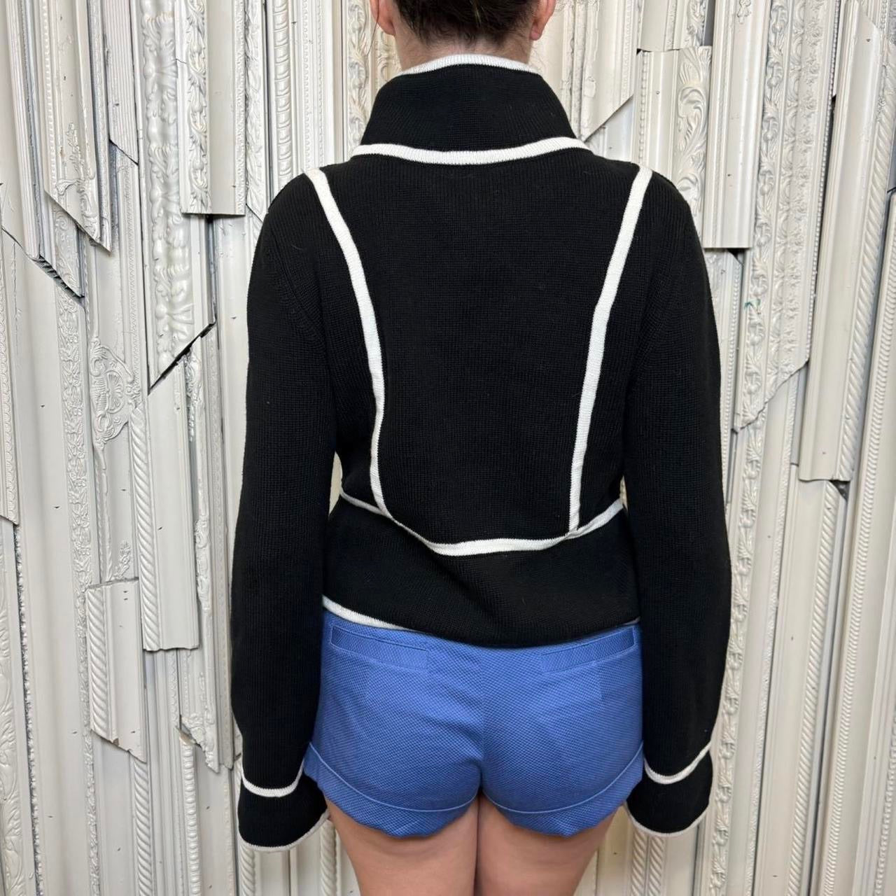 Black and white hidden button sweater