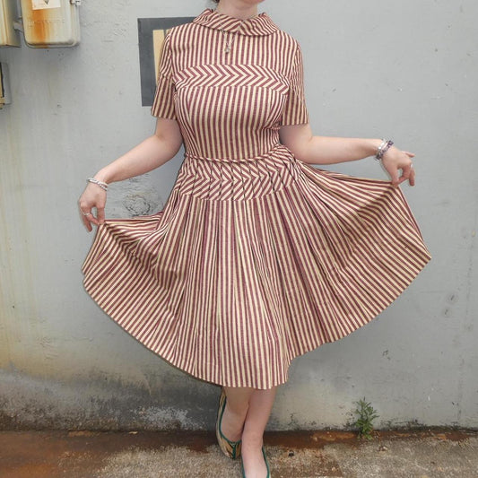 Herman Marcus Vintage tan and red striped knee length pleated dress