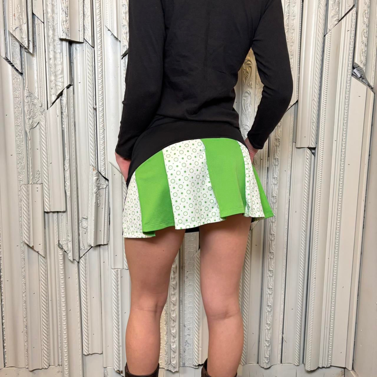 Prince black, white and green pleated back mini skirt