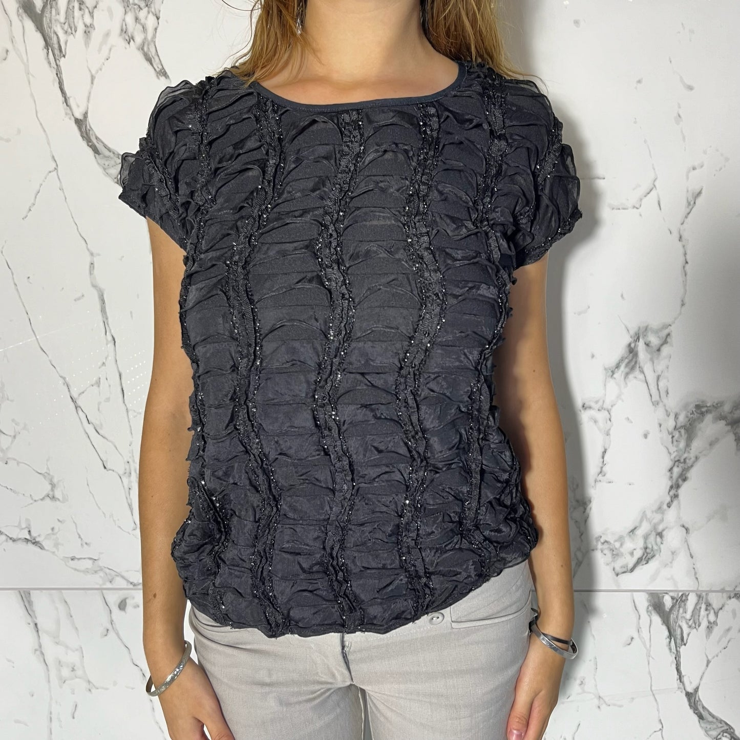 New Directions black blouse with sequin detailing and ruffles