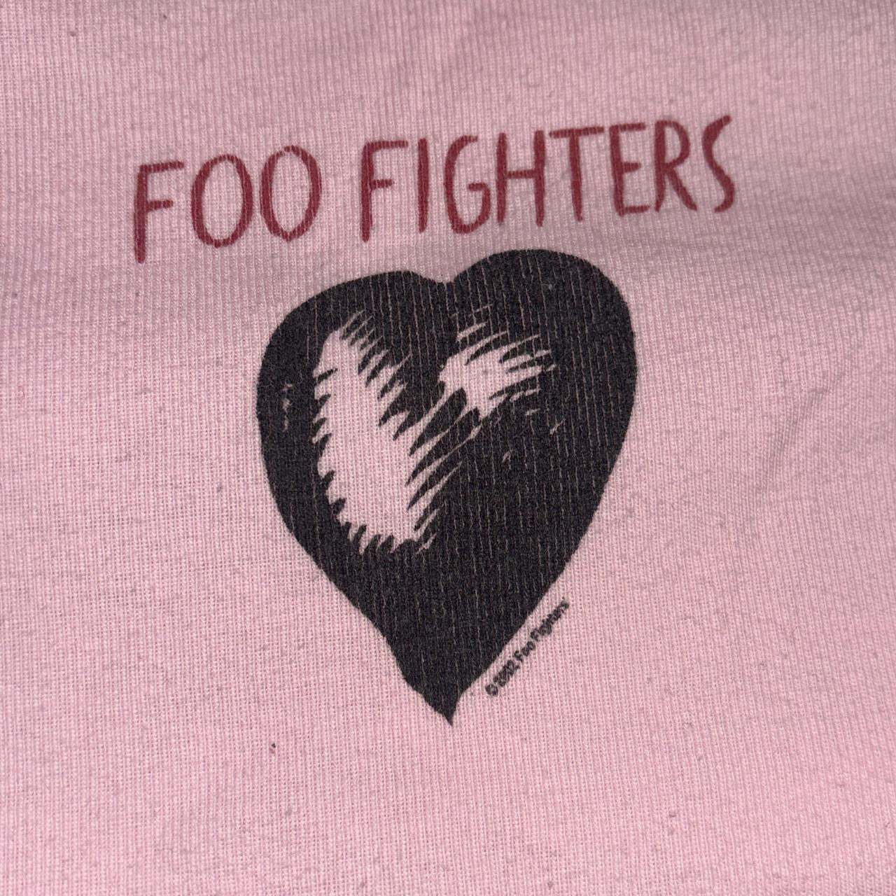 Kavio “2002 Foo Fighters” heart graphic pink baby tee