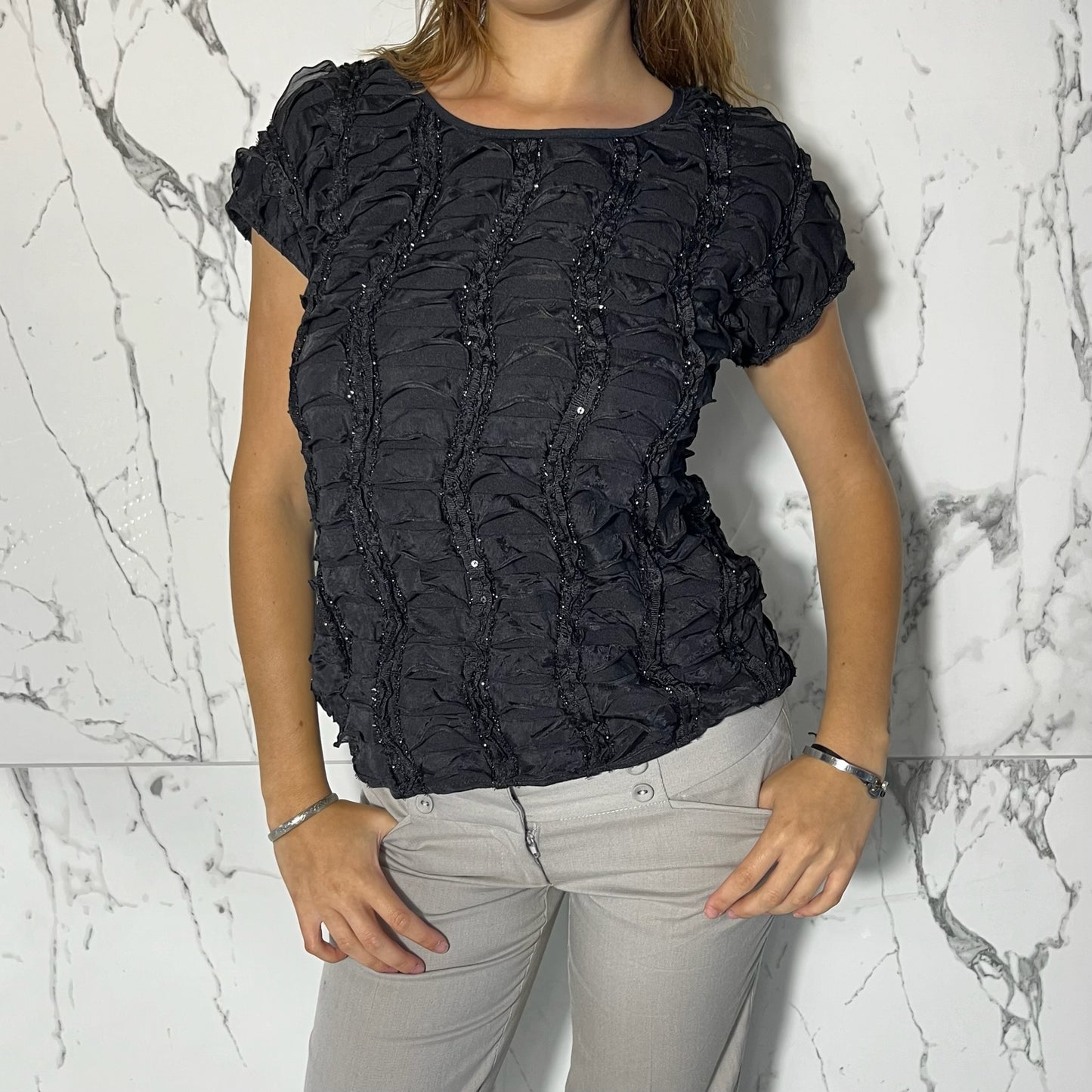 New Directions black blouse with sequin detailing and ruffles