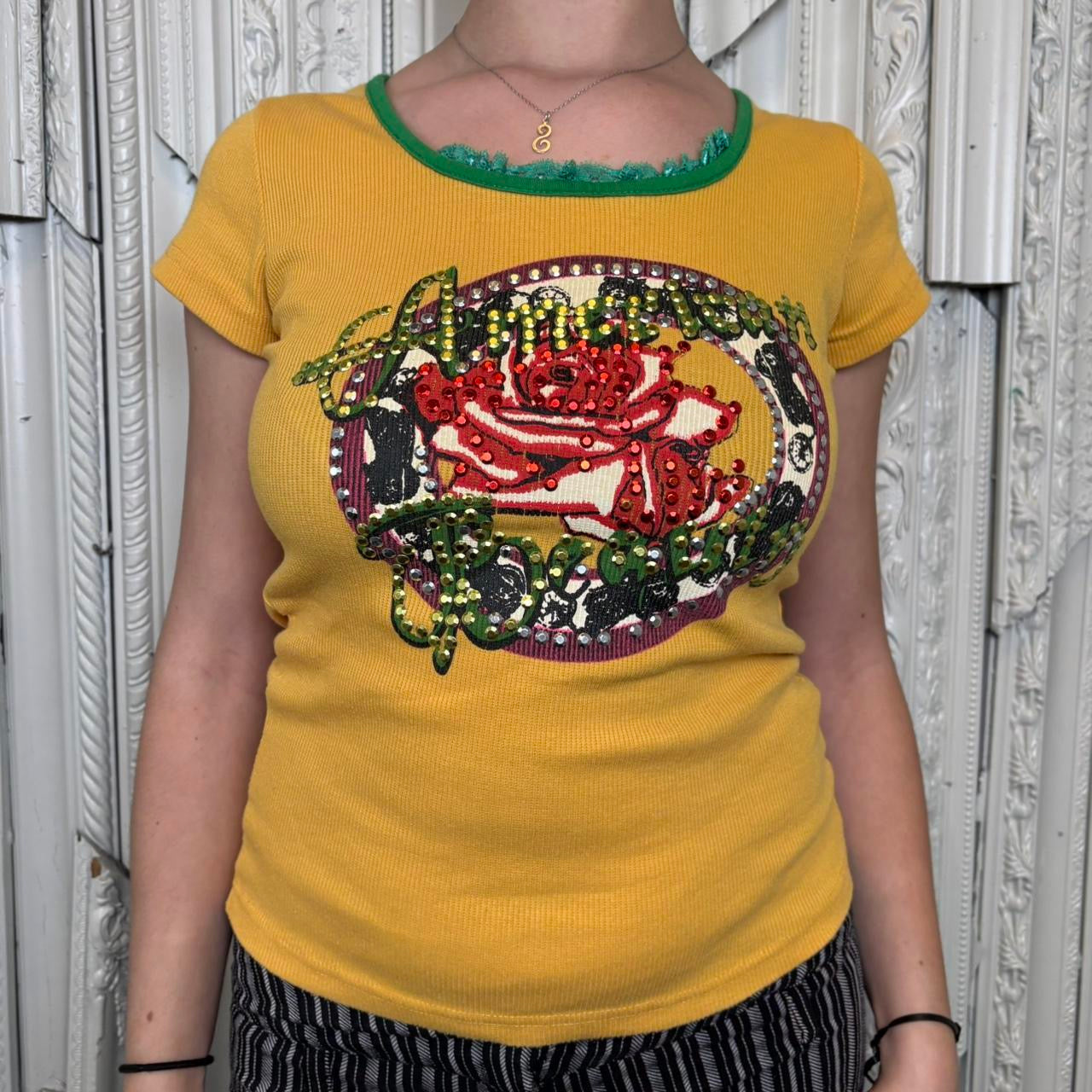 Calm yellow graphic baby tee with rhinestone detailing