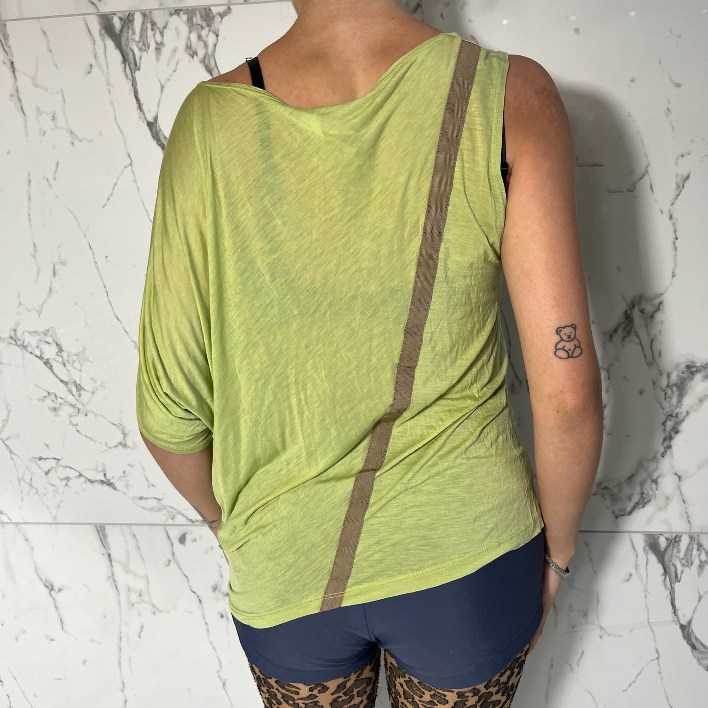 Maggie Ward green slouchy tee with stripe on back