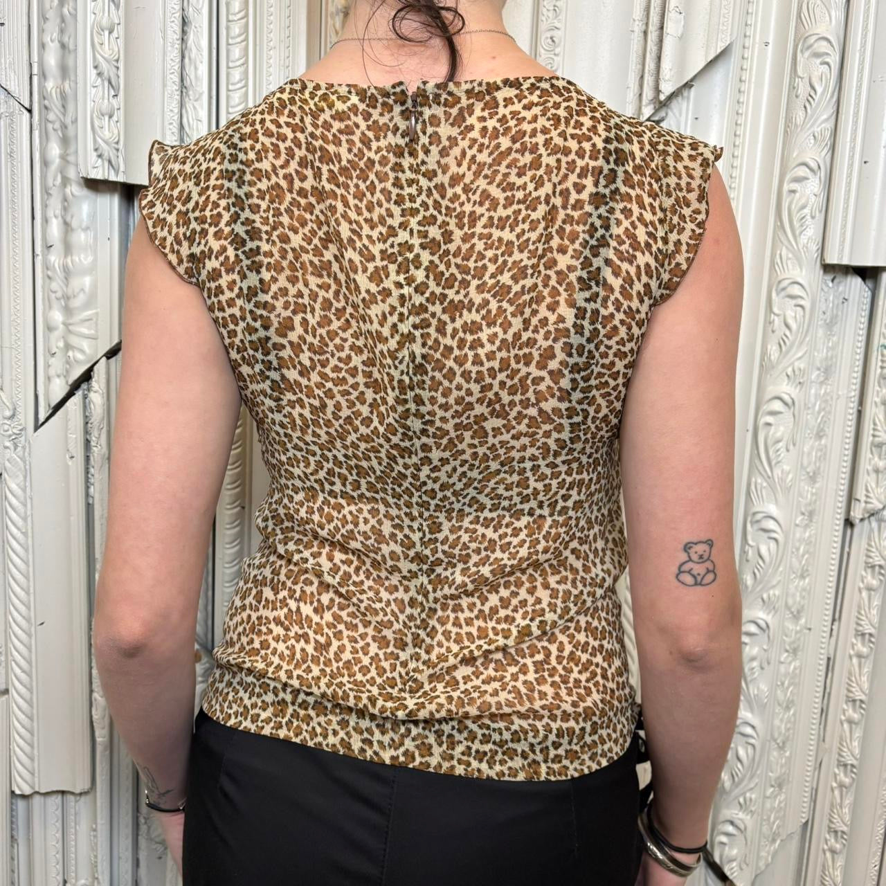 Nice Claup sheer cheetah print v neck cap sleeve blouse