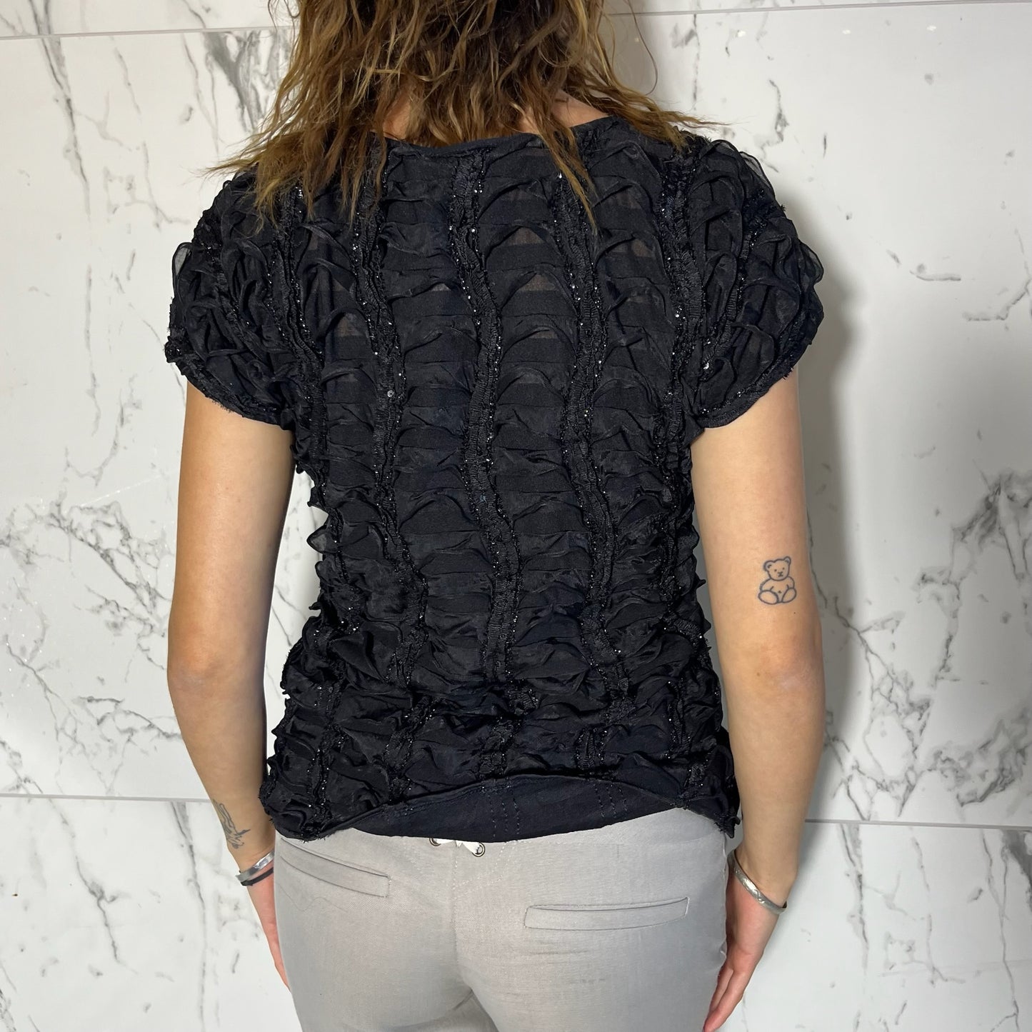 New Directions black blouse with sequin detailing and ruffles