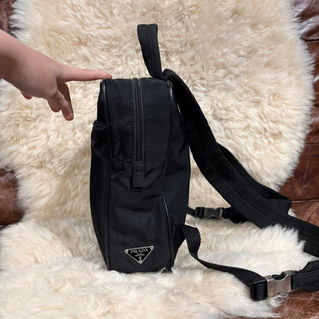 Prada black nylon backpack with silver buckle hardware