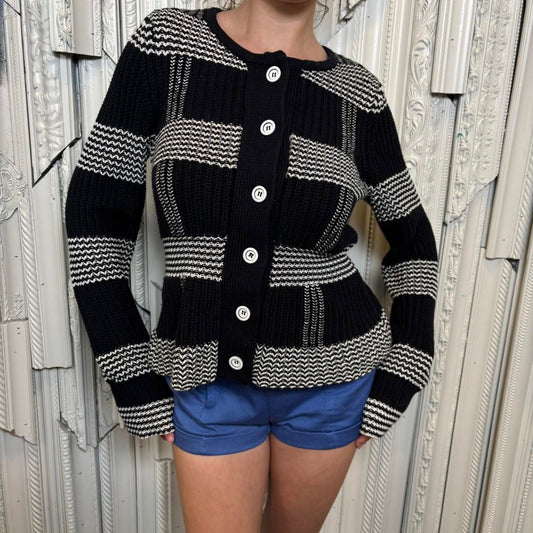 Harold’s black and white cotton knit peplum sweater